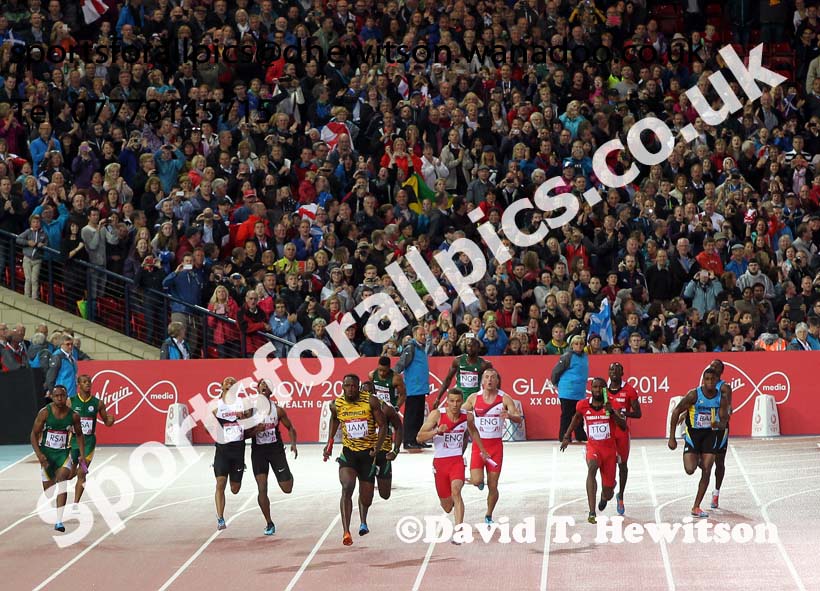 Usain Bold takes Jamaica into the lead and on to victory in the 4 x 100 metres at the Commonwealth Games, Glasgow. Photo: David T. Hewitson/Sports for All Pics
